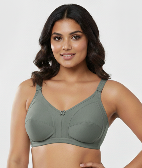 Fanzoh plus size full coverage bra in green worn by smiling woman with adjustable straps